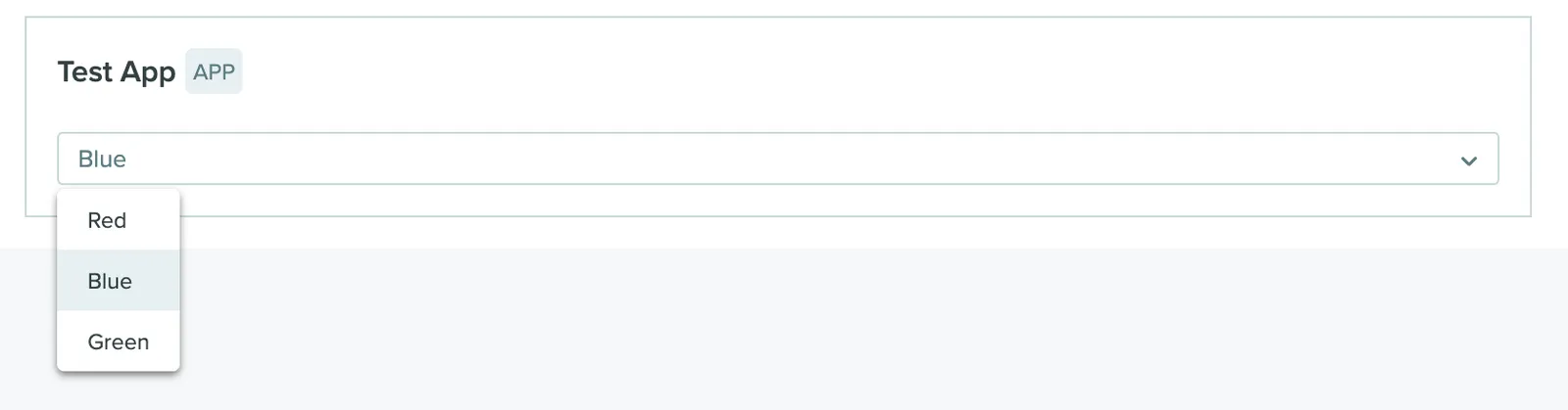 An App Canvas showing a selector input with app-defined options in a dropdown list