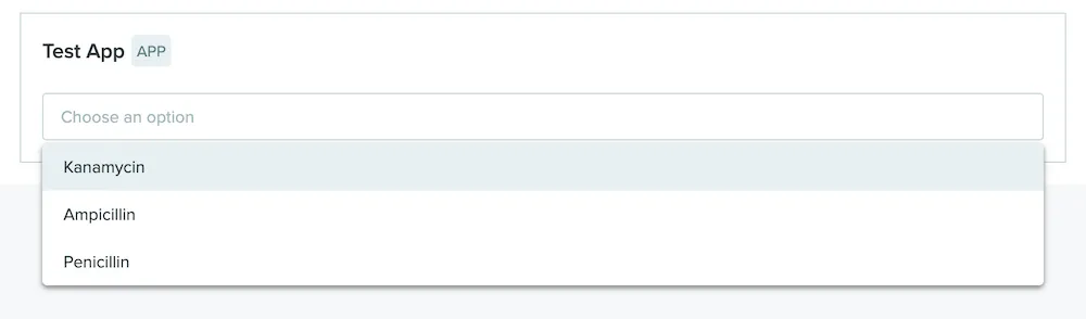 An App Canvas showing a dropdown menu with a selected option